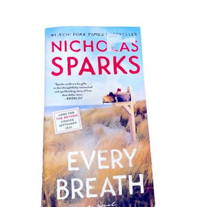 Nicholas Spark’s paperback book Every Breath